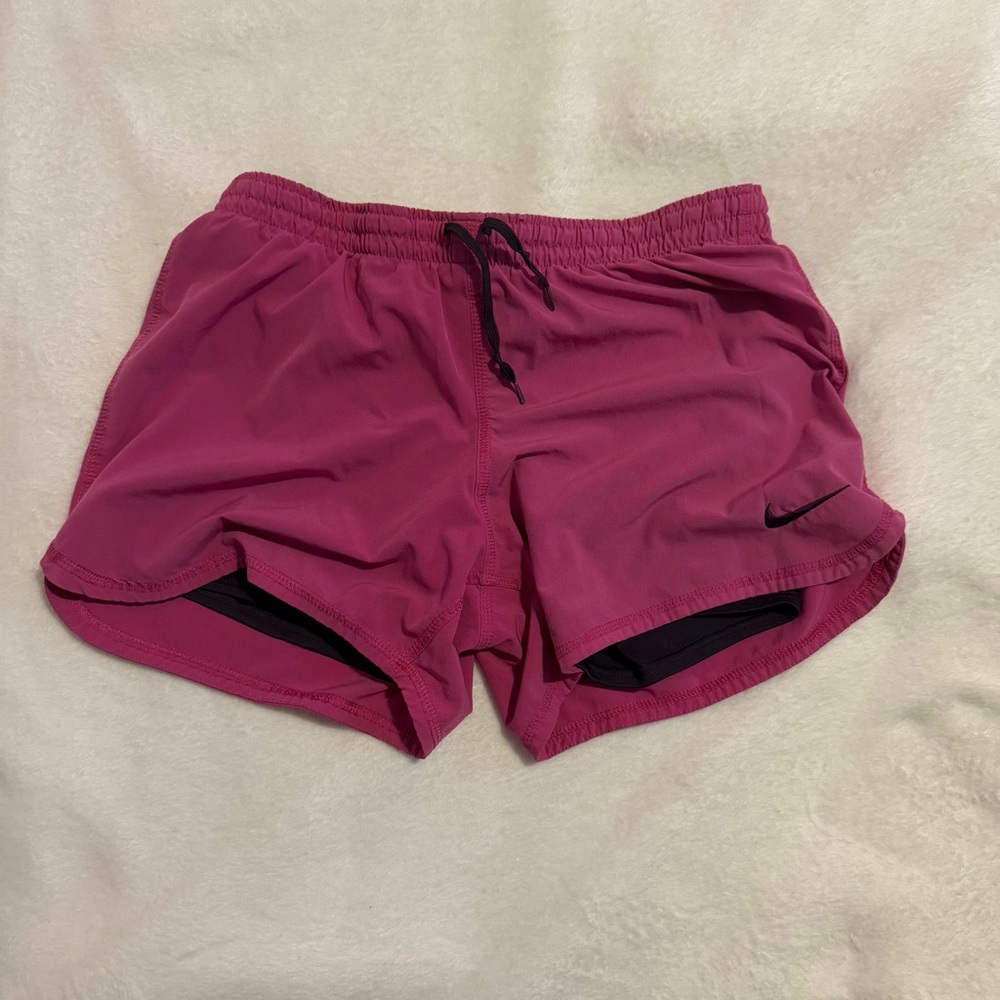 pink Nike running shorts